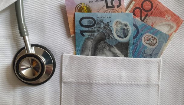 Australian,Money,In,The,Bag,Of,A,White,Fabric,Gown