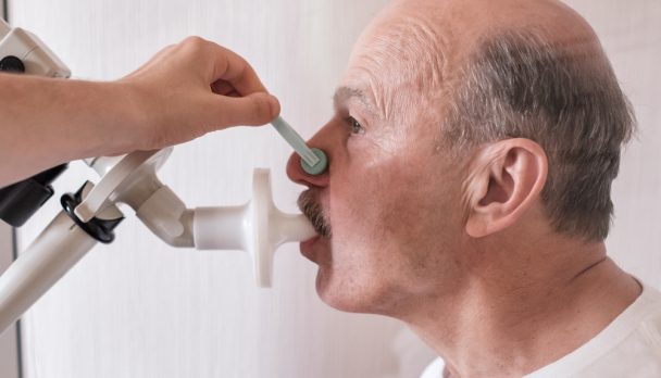 Senior,Hispanic,Man,Man,Testing,Breathing,Function,By,Spirometry.,Diagnosis